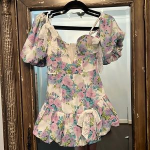 For love and lemons. XXS, purple floral mini dress with removable bows detail.